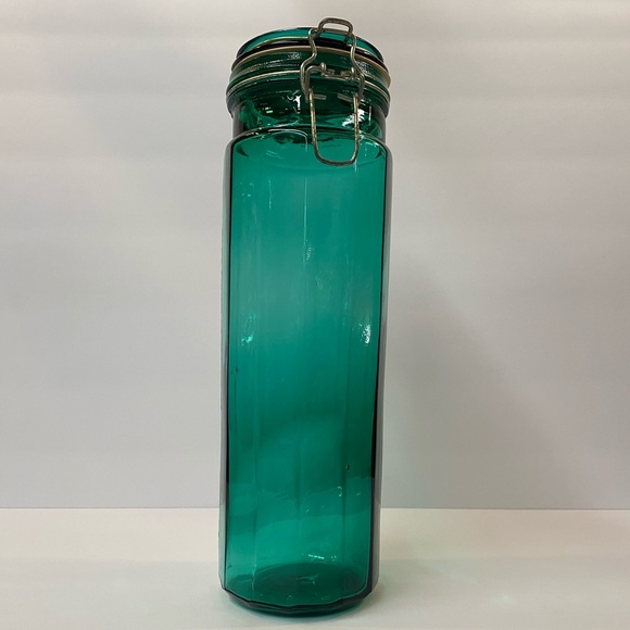 Dark green vintage container with lid